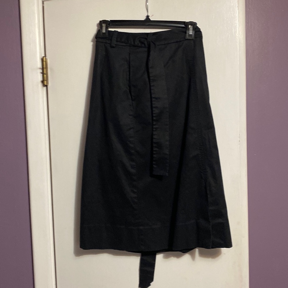 Mid length black skirt